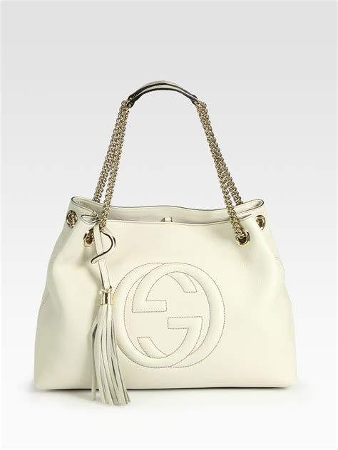 kolory gucci|white Gucci handbag.